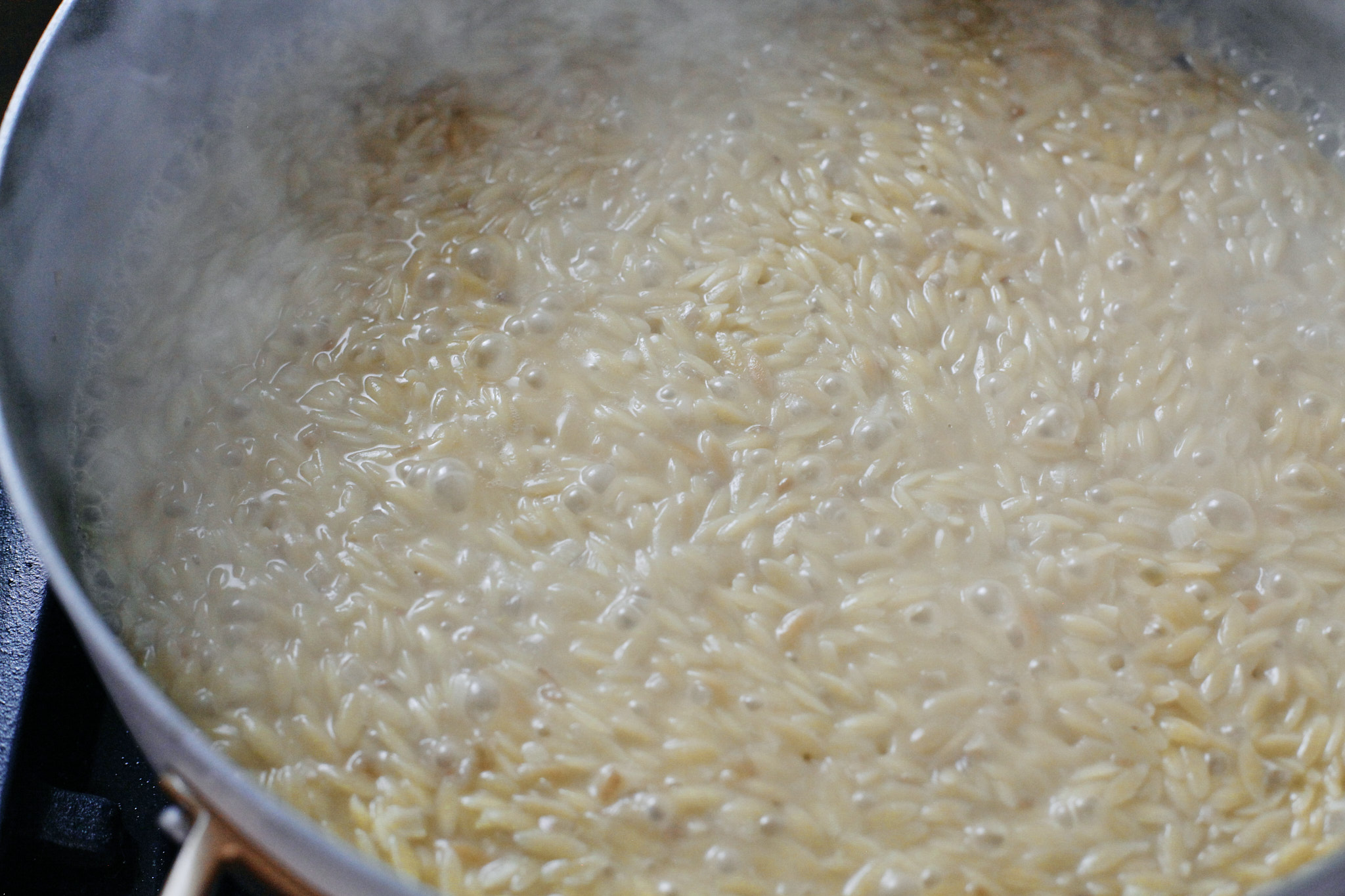 orzo absorbing the broth liquid