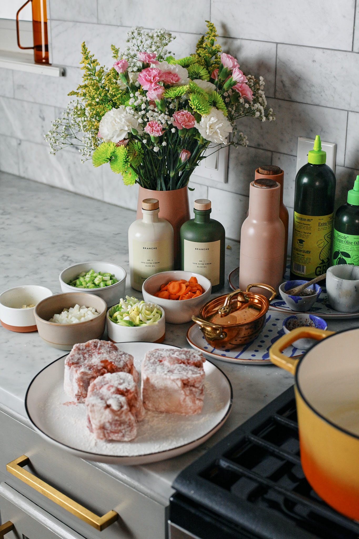 oxtail dredged in flour about to be seared