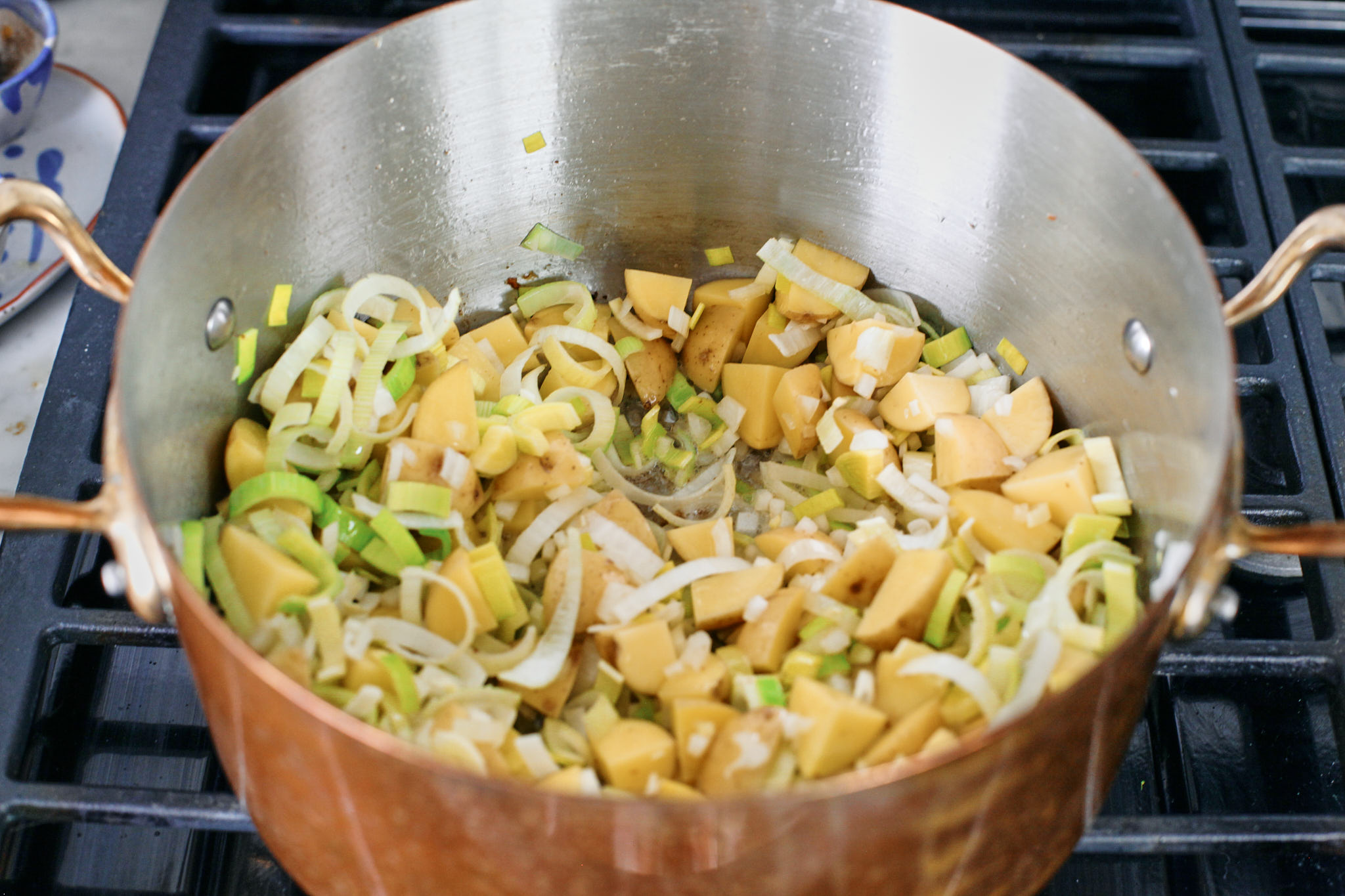 potato, leek, onion and garlic sautéeing