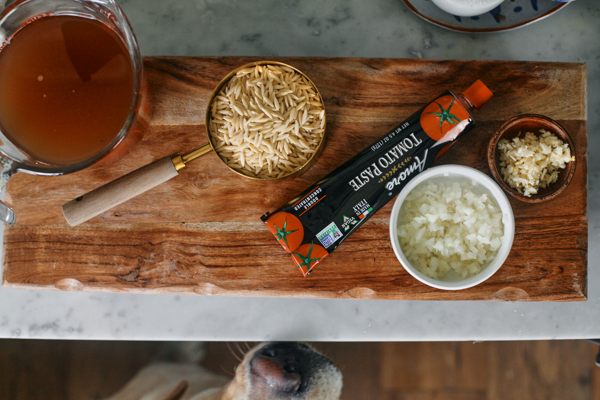 prep for one pot creamy tomato orzo : onion, garlic, tomato paste, orzo and broth