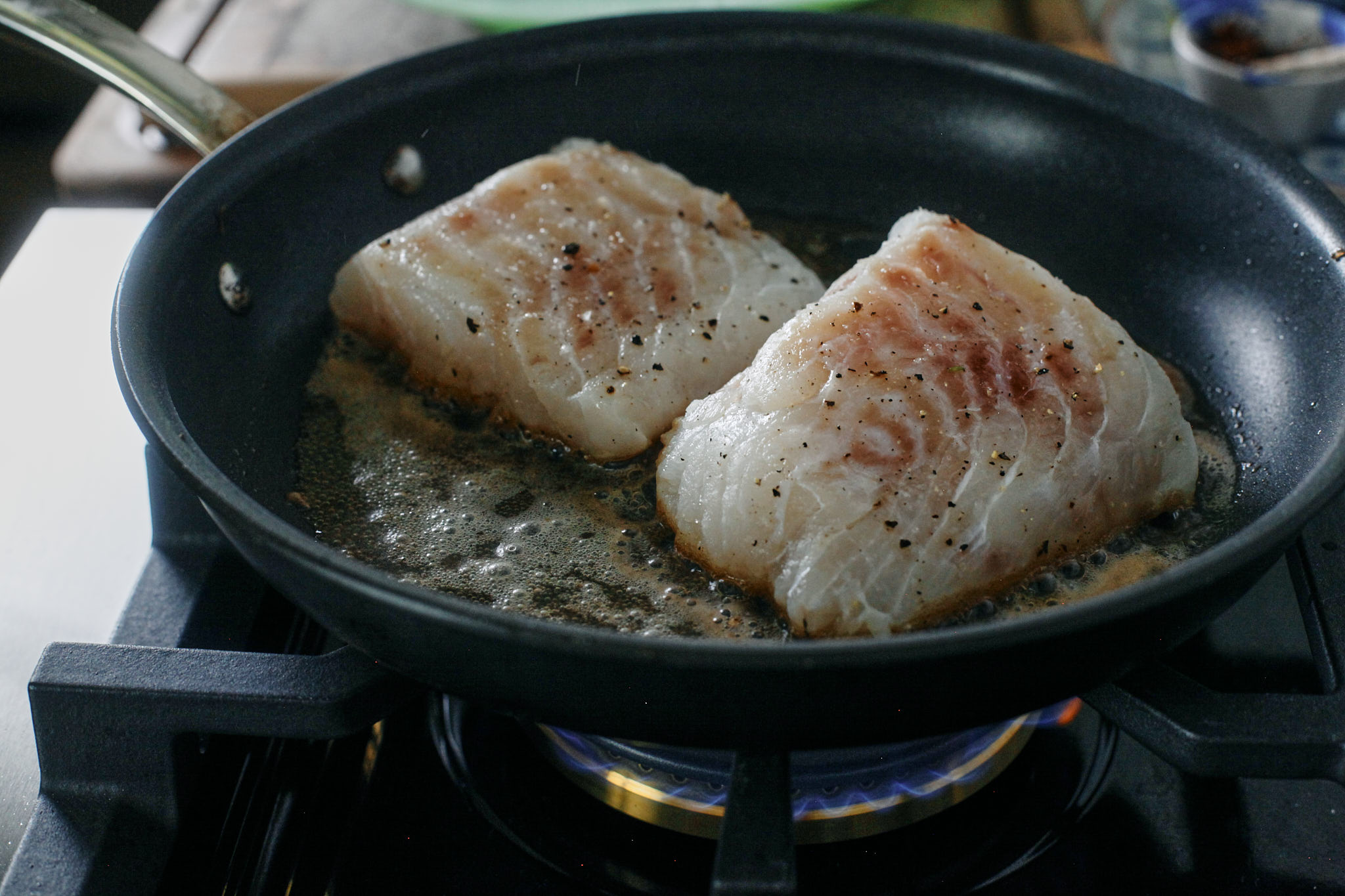 Lemon Butter Cod 9 cod searing in butter and olive oil