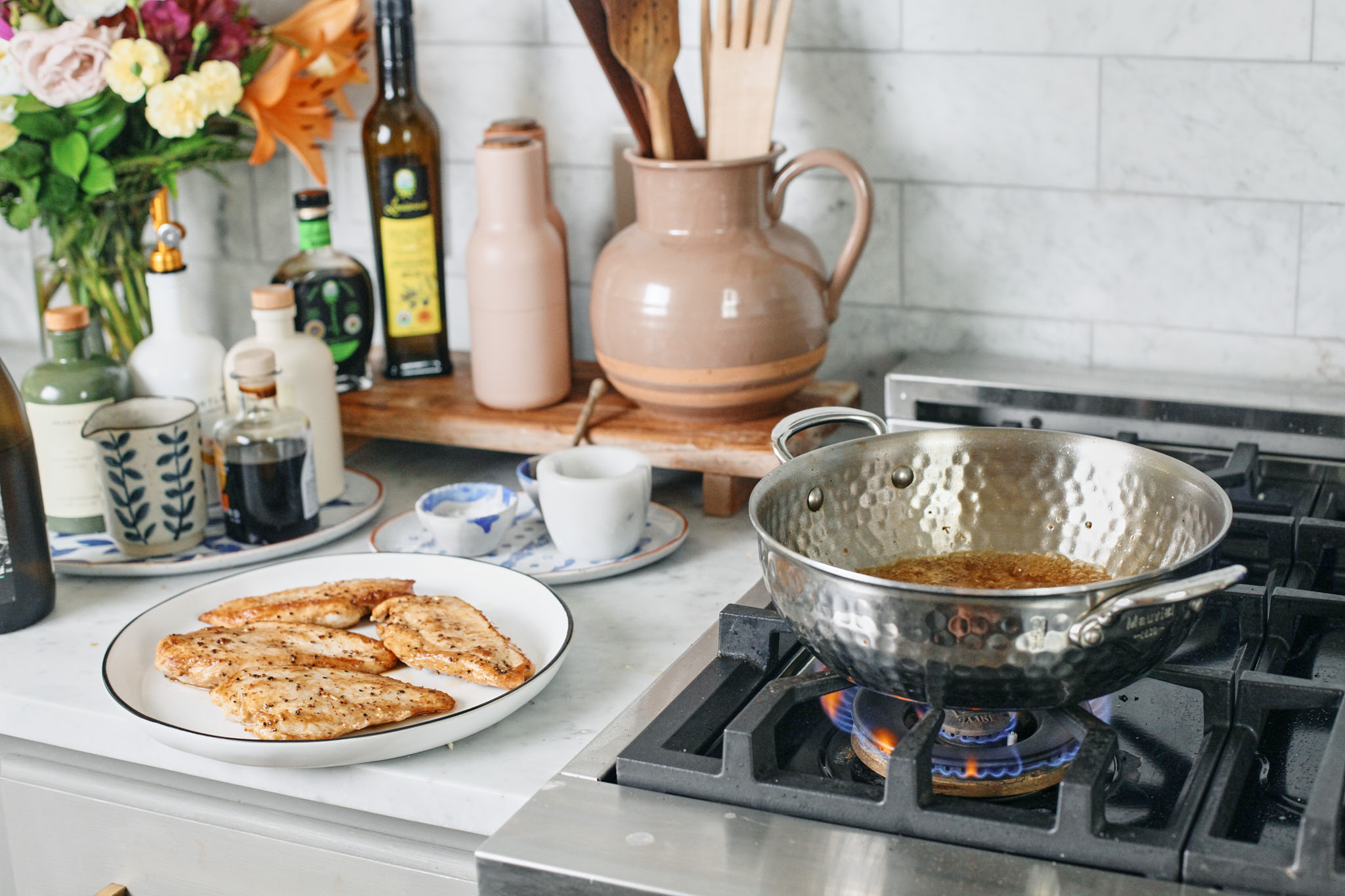 starting the pan sauce with the shallots and garlic