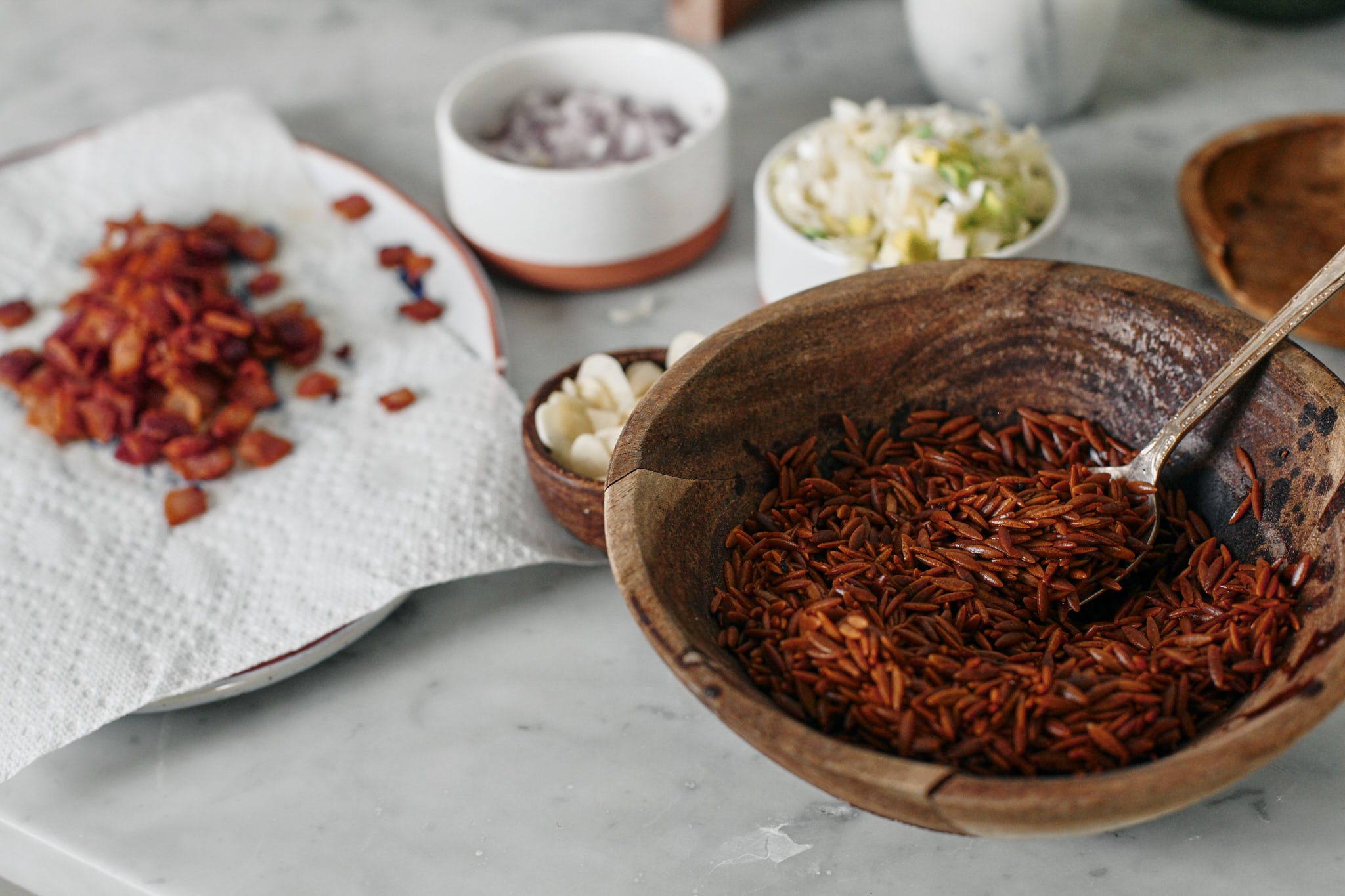 prep for the toasted orzo potato leek soup - chopped shallot, leek, garlic, bacon and crispy toasted orzo