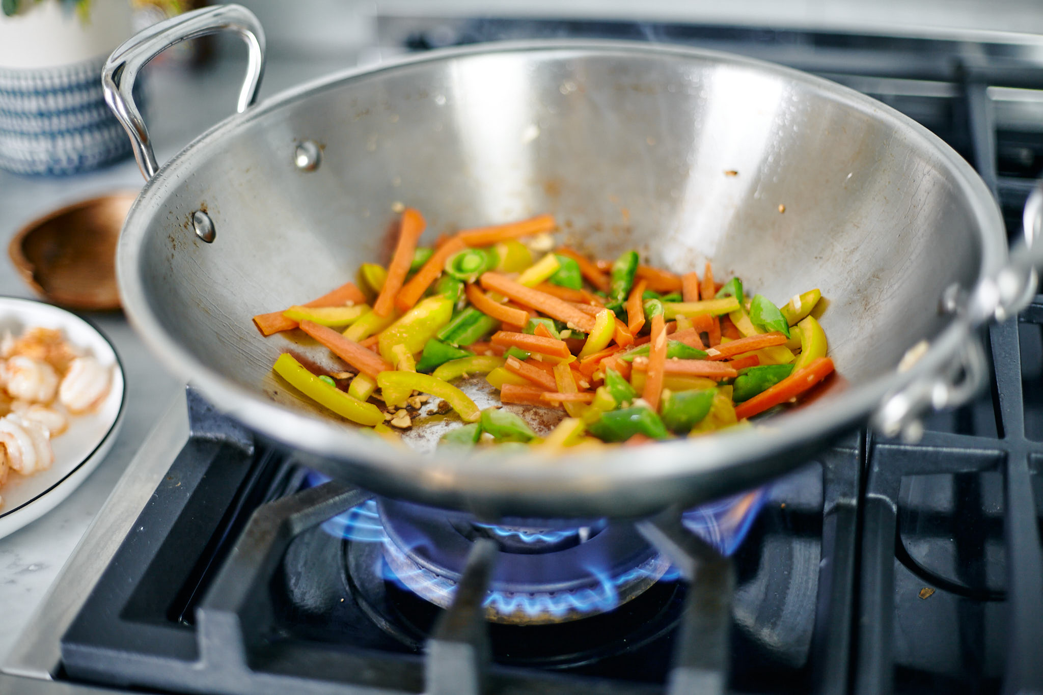 vegetables stir drying in wok