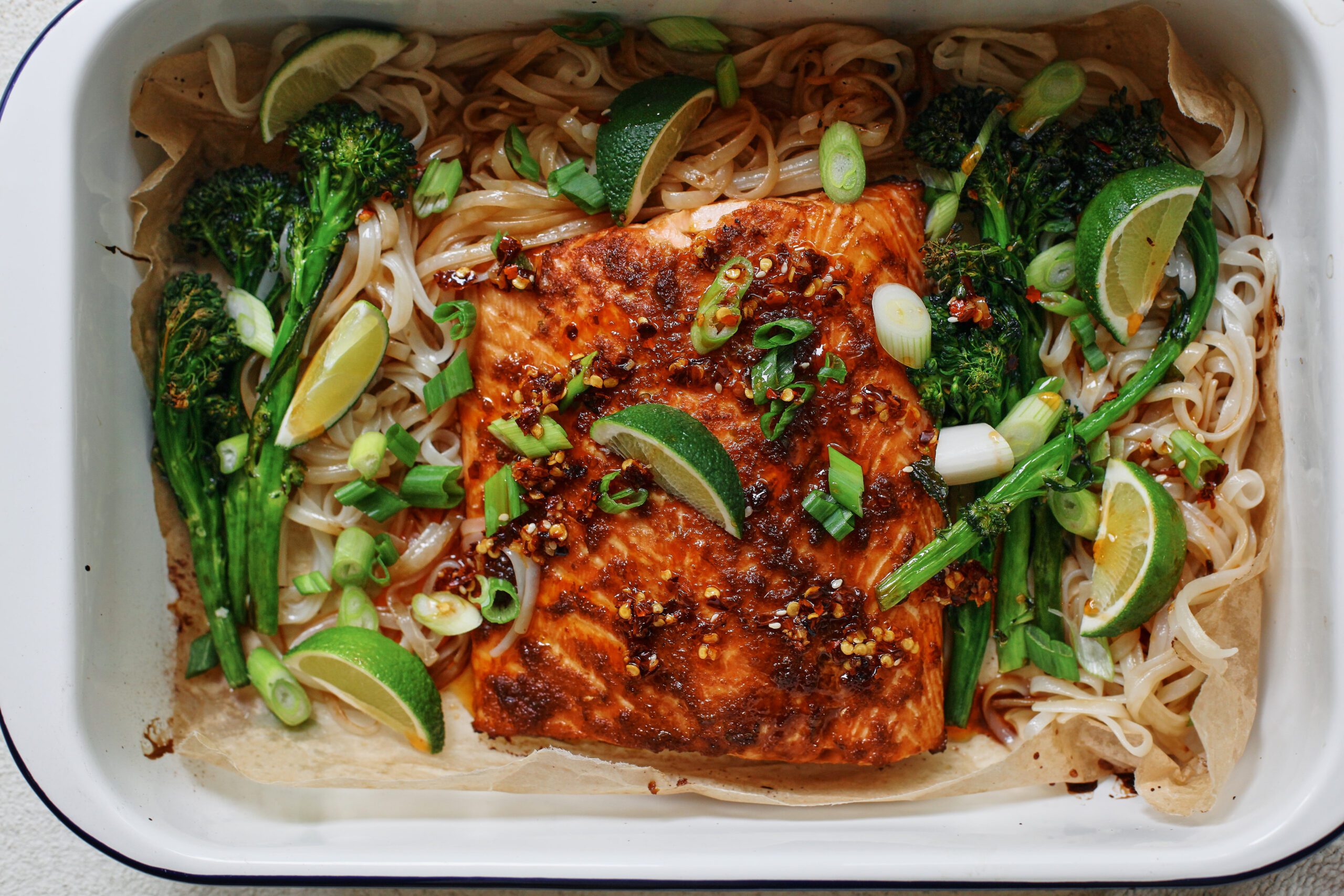 sheet pan sticky salmon and noodles with broccolini