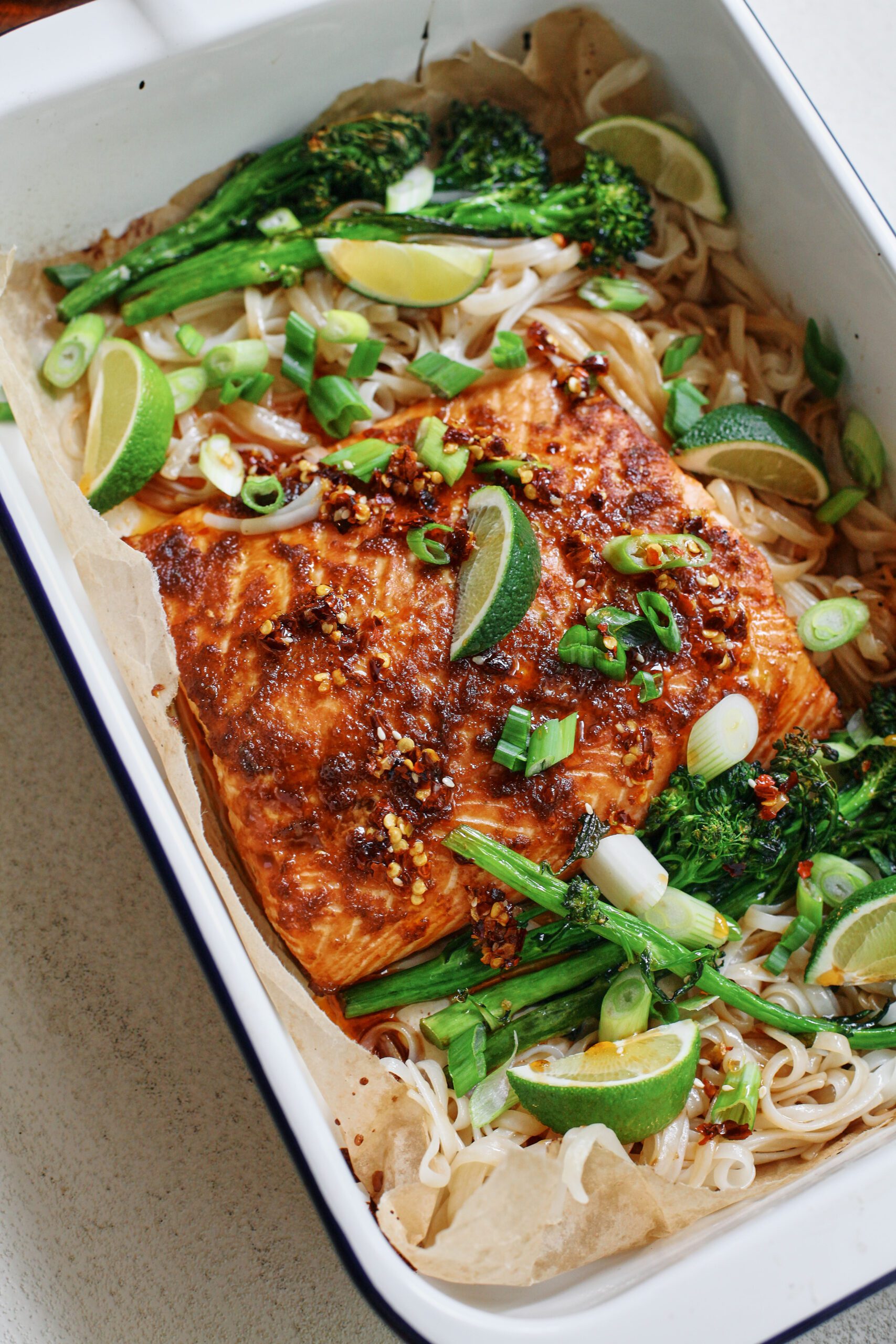 sheet pan sticky salmon and noodles with broccolini
