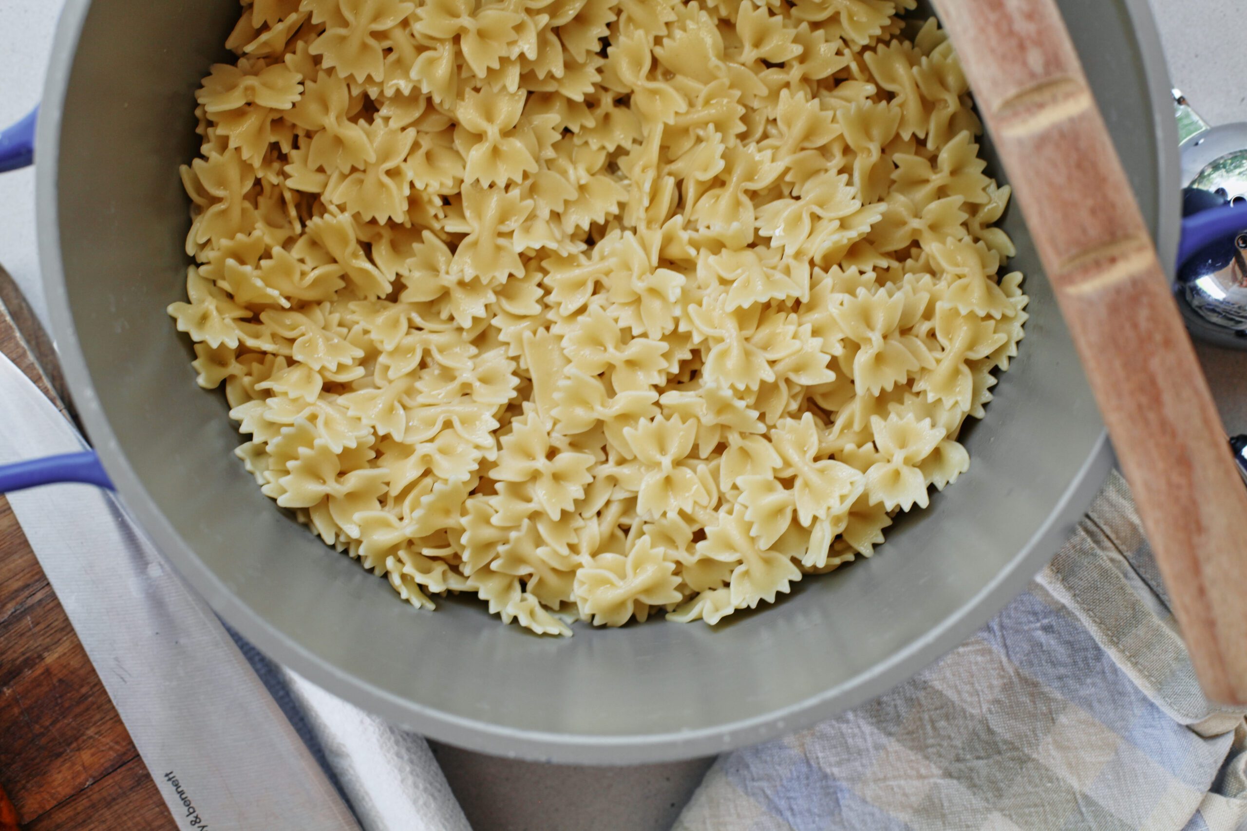mini farfalle pasta in a large bowl