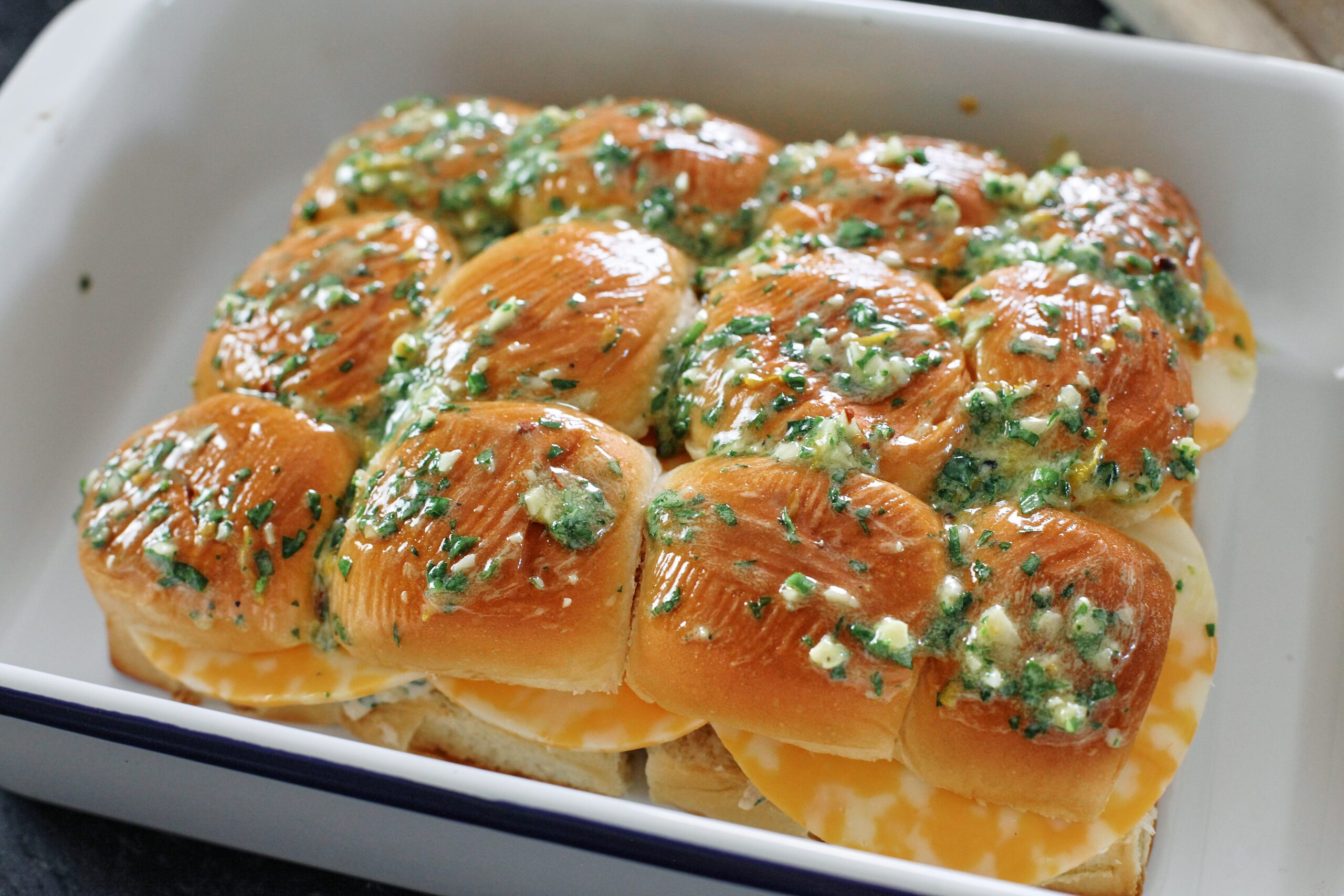 shredded chicken sliders with cowboy butter, before being baked