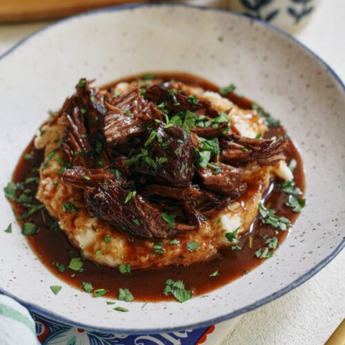 braised beef over mashed potatoes