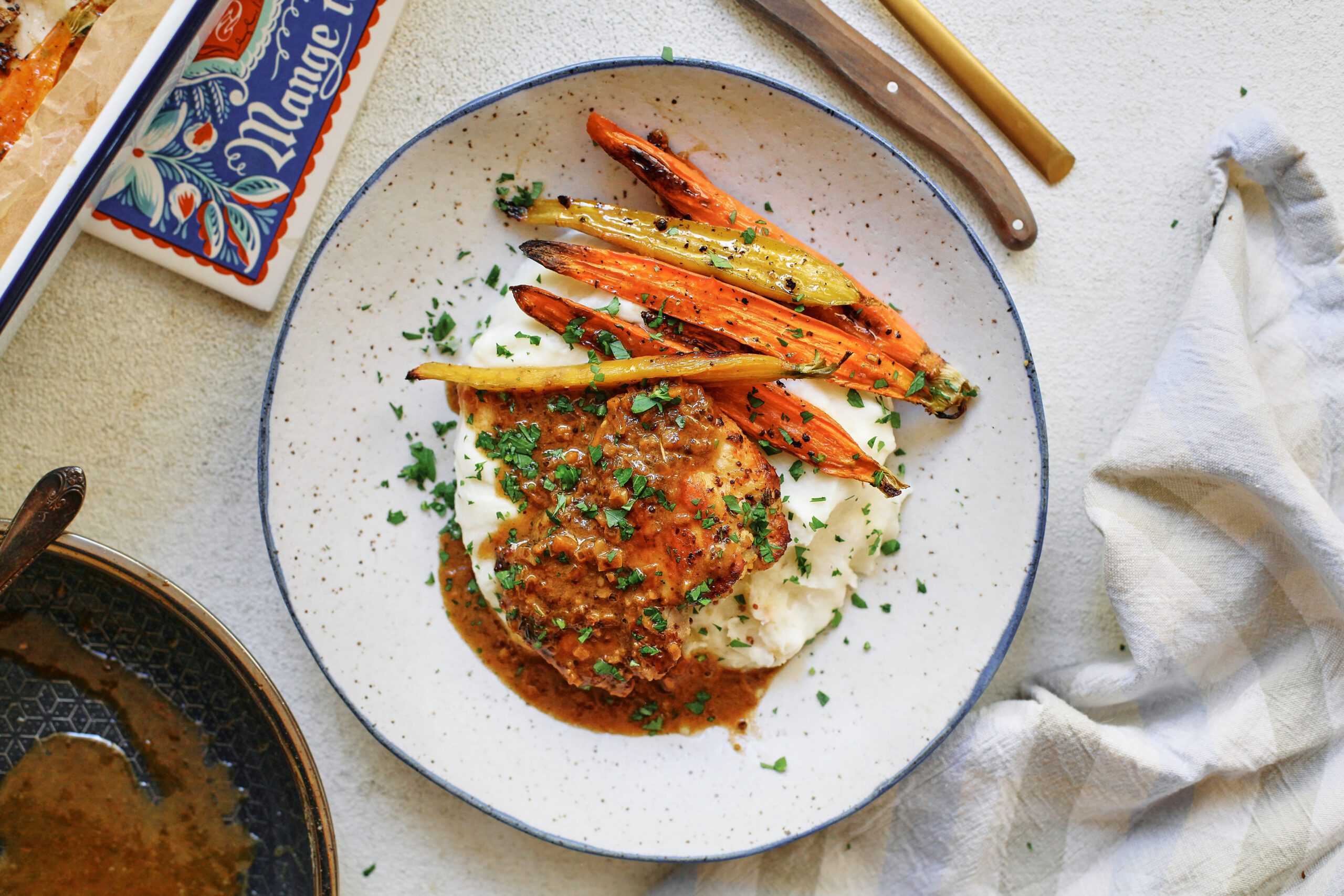 garlic herb chicken with honey butter carrots and mashed potatoes