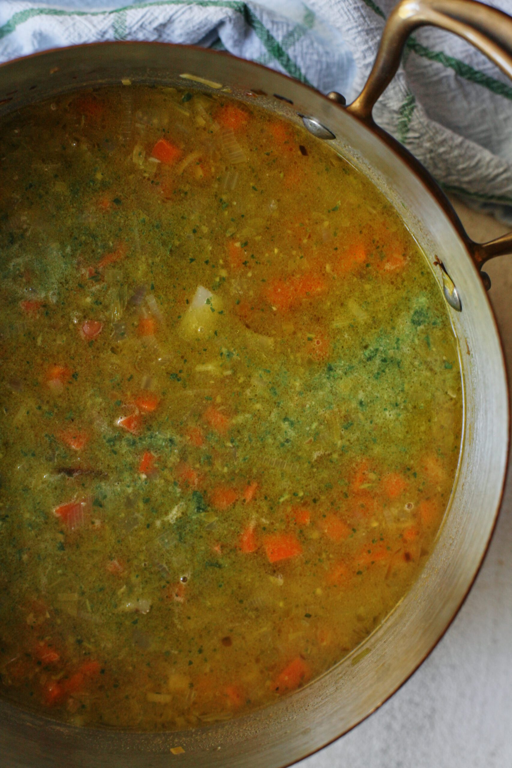 pesto minestrone soup in a large pot