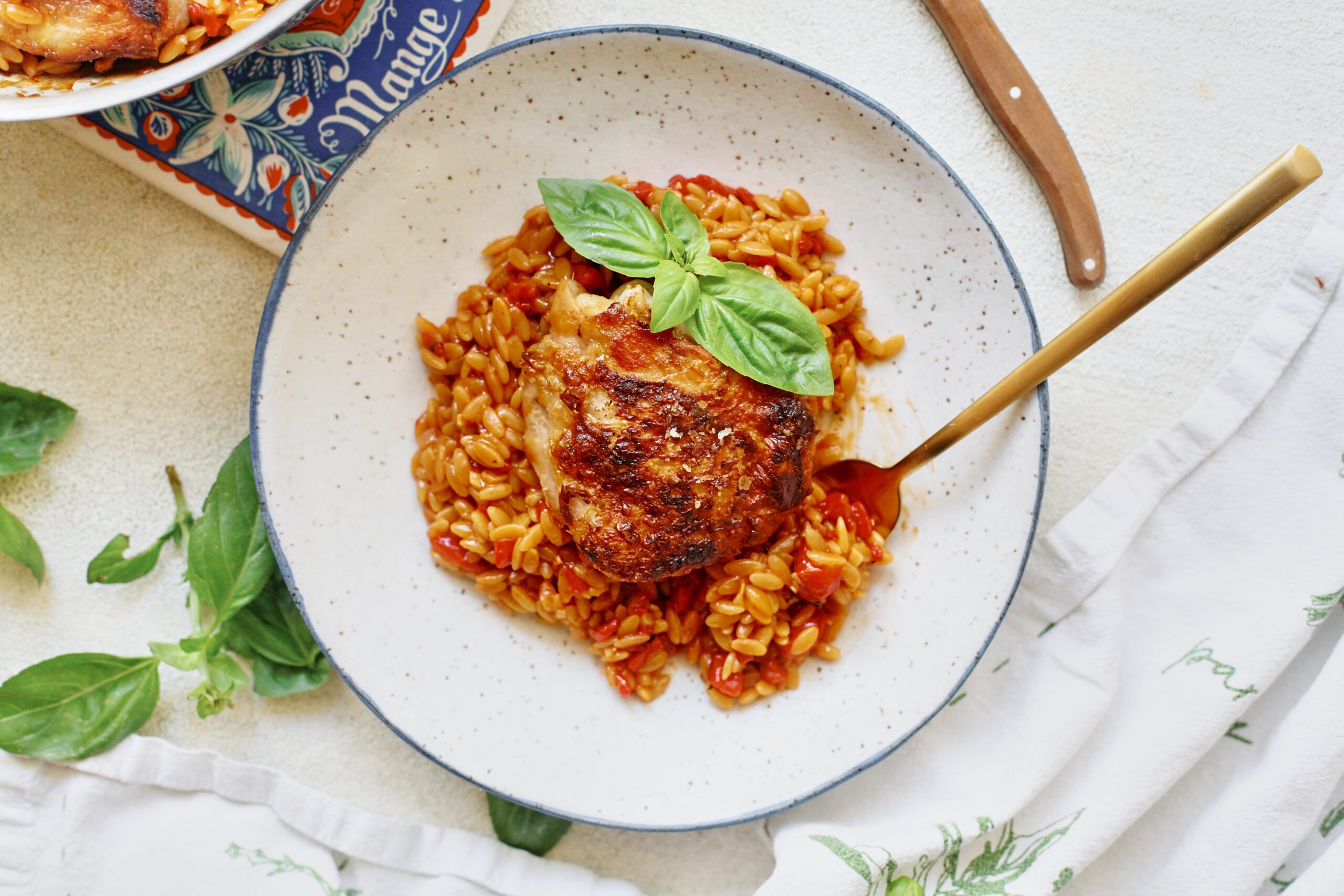 crispy chicken thighs with roasted red pepper orzo