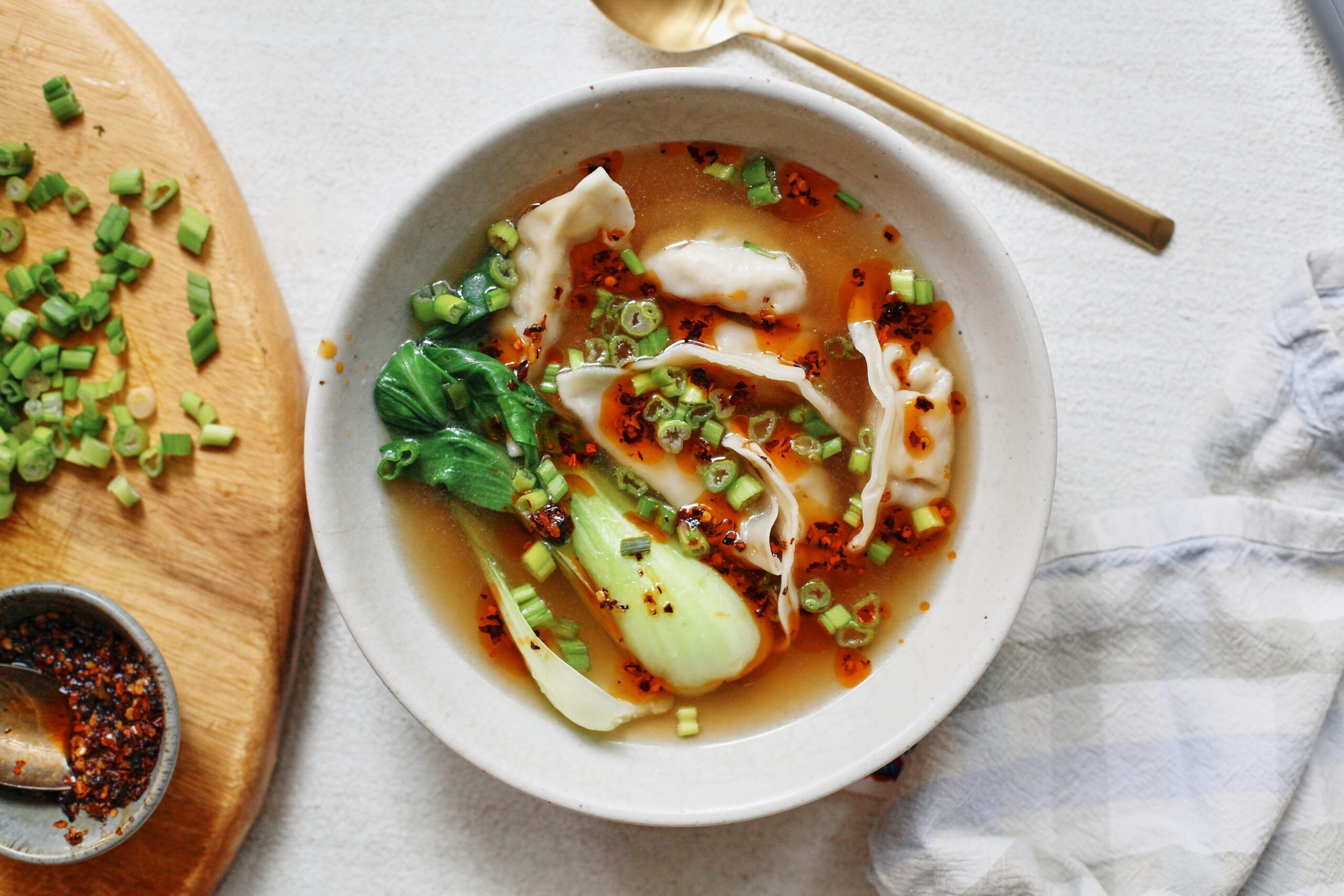 brothy dumpling soup with baby bok choy