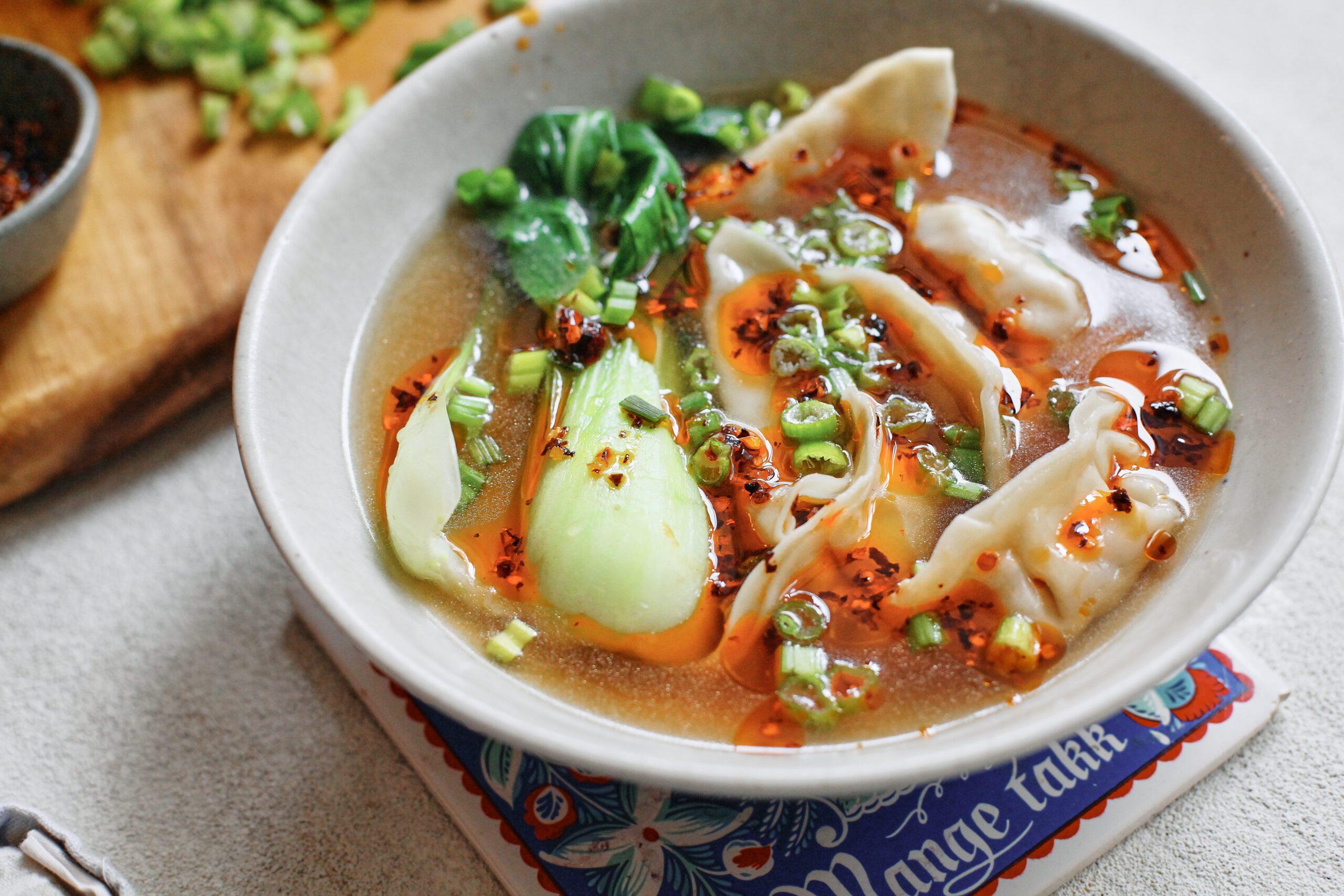 brothy dumpling soup with baby bok choy