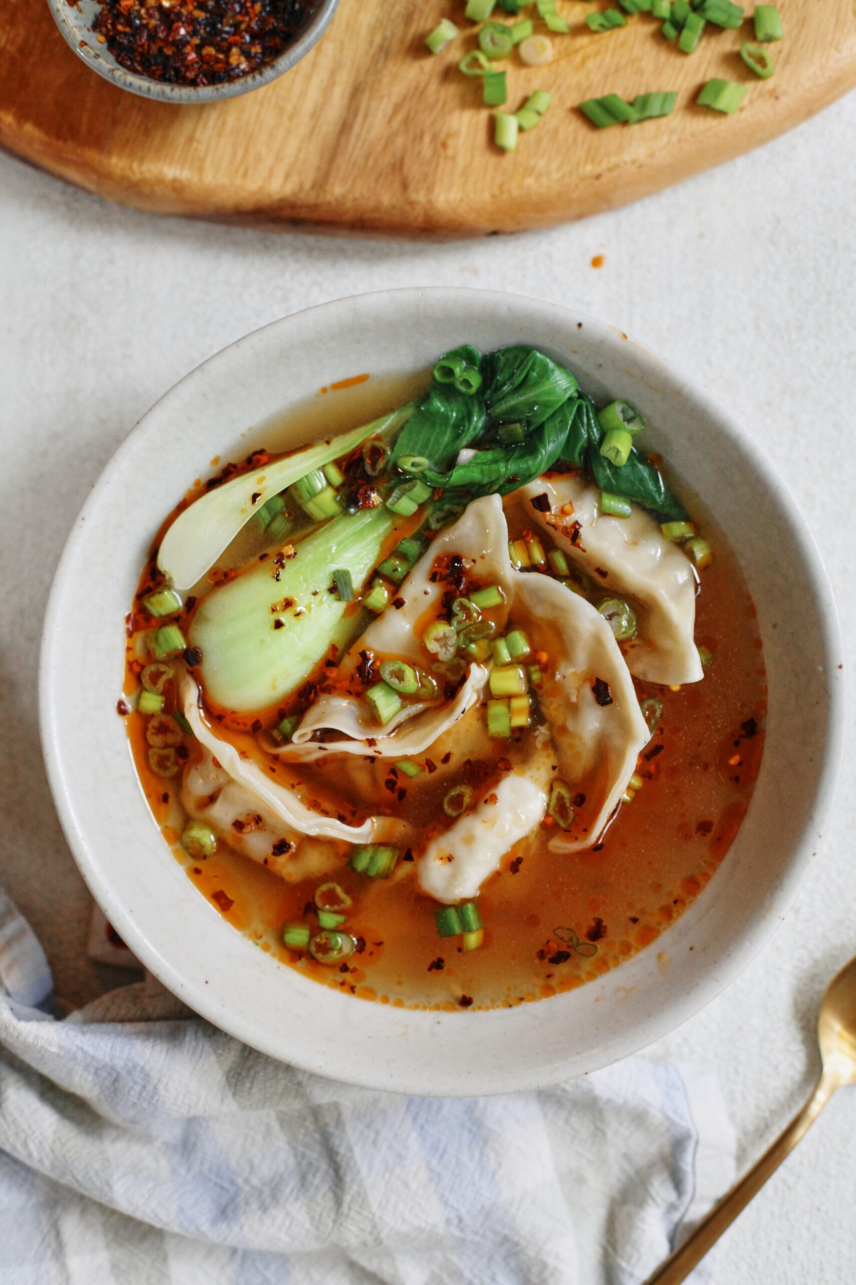 brothy dumpling soup with baby bok choy